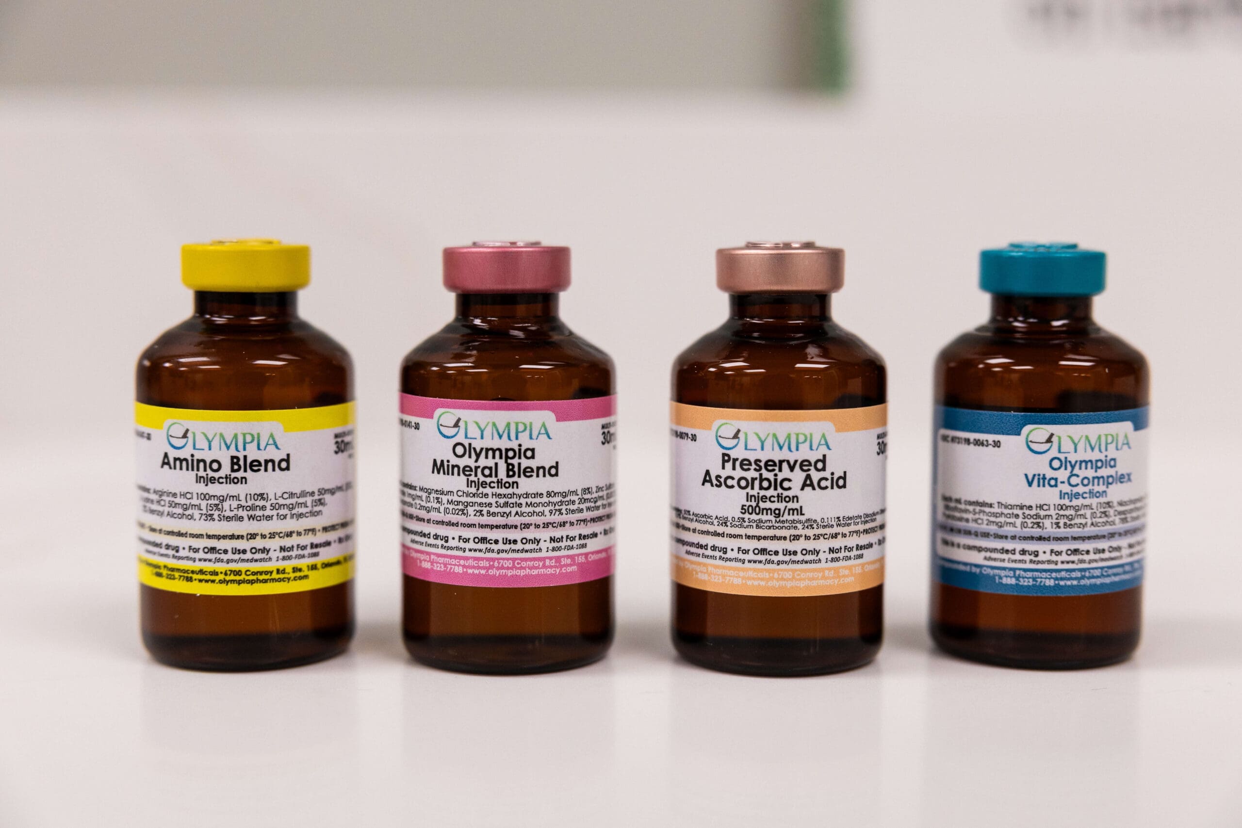 Details of various injection bottles on a table