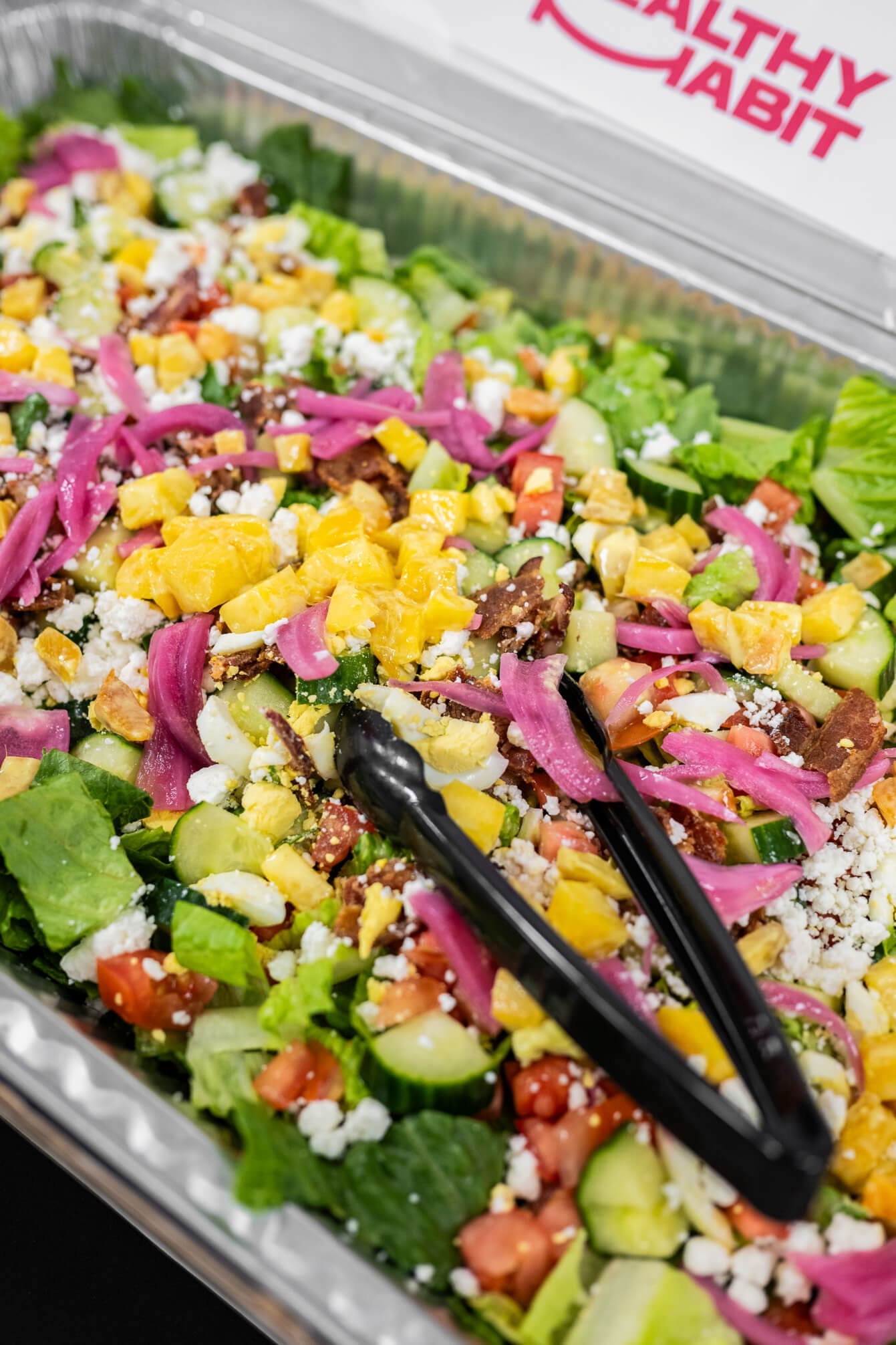 Details of a delicious salad in a catering tray